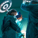 surgeons performing operation
