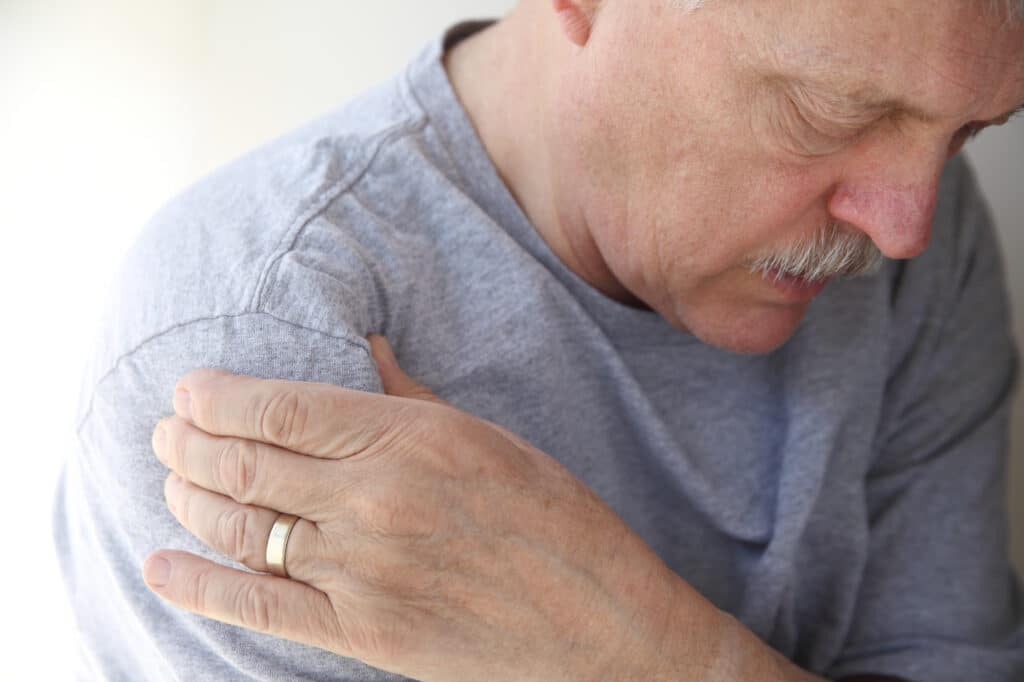 senior man experiencing shoulder pain